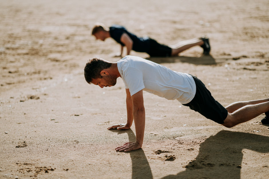 Men working out together