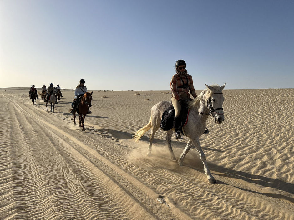 Horse riders in the Tunisian desert
